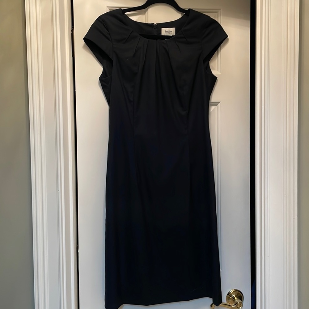 Neiman Marcus Exclusive black cocktail dress with cap sleeve. Size 4.
